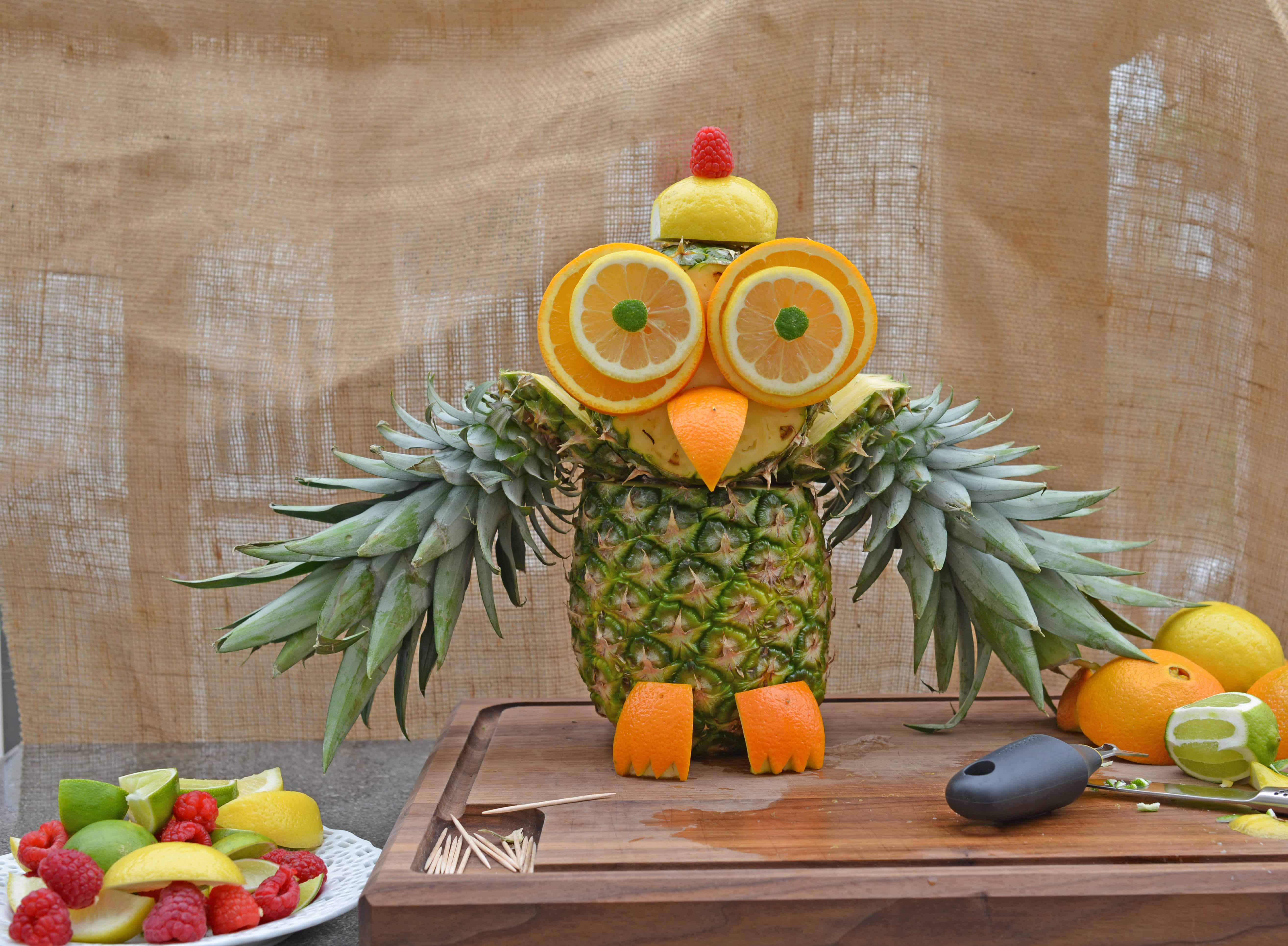 Pineapple Owl Fruit Sculpture- take melon craving to a whole new level with this cute fruit animal owl. This fruit carving idea only takes 15 minutes and is super easy, without much actual “carving” at all. Plus, pineapple recipes so your pineapple owl doesn’t go to waste. www.savoryexperiments.com