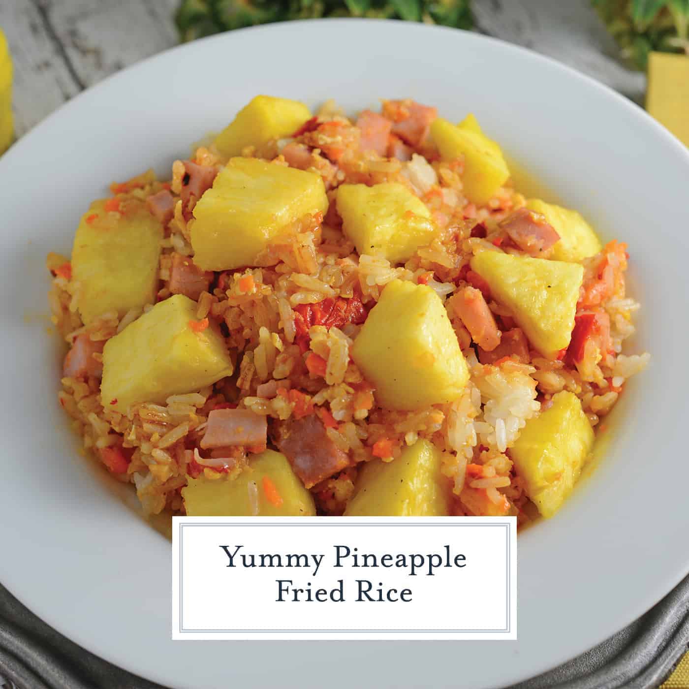 Pineapple Fried Rice is a quick, easy weeknight meal that's much cheaper, tastier and healthier than take-out! Make it a vegetarian meal or add ham. #pineapplefriedrice #easyfriedricerecipe www.savoryexperiments.com