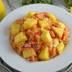 Pineapple Fried Rice Recipe - A quick and easy weeknight meal that's so much cheaper, tastier and healthier than take-out! Make it a vegetarian meal or add ham. www.savoryexperiments.com