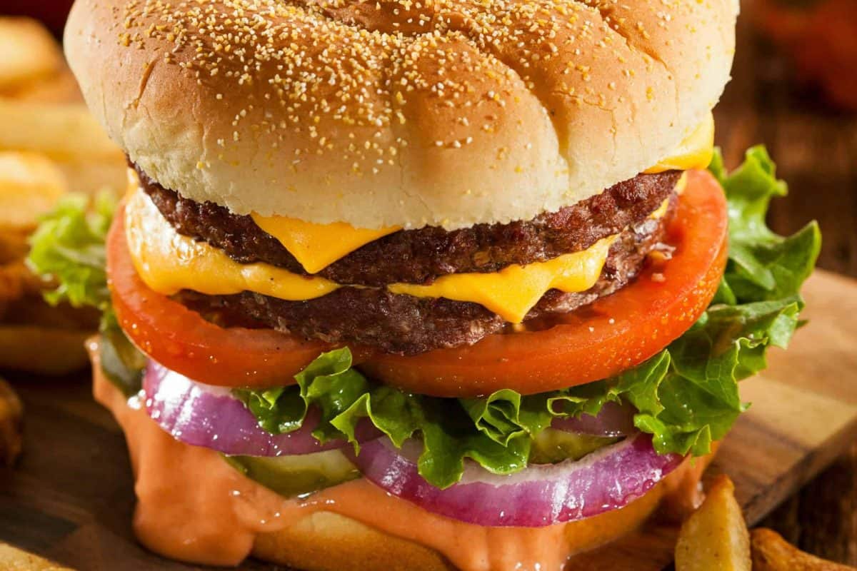 close up of burger patty recipe cooked with toppings 