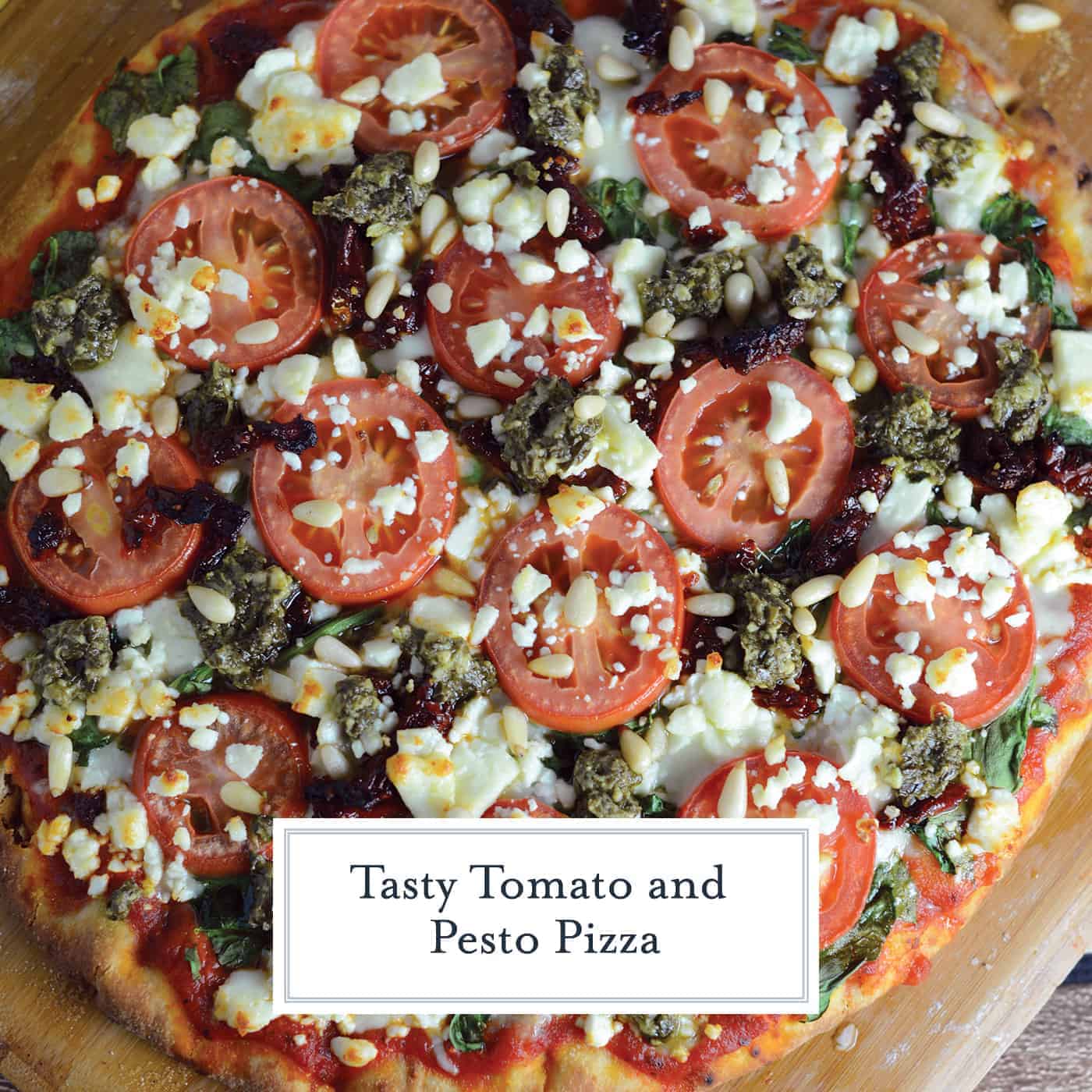 Tomato Pesto Pizza is an easy vegetarian pizza with fresh tomato slices, mozzarella and feta cheese, sun dried tomatoes, pesto and toasted pine nuts. #homemadepizza #pizzafromscratch #pestopizza www.savoryexperiments.com 