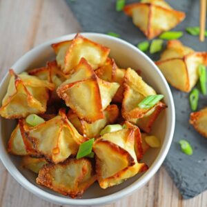 Wasabi Chicken Potstickers are homemade dumplings packed with ground chicken, nose flaring wasabi, ginger and seasonings. Dip in my famous potsticker sauce! #chickenpotstickers www.savoryexperiments.com