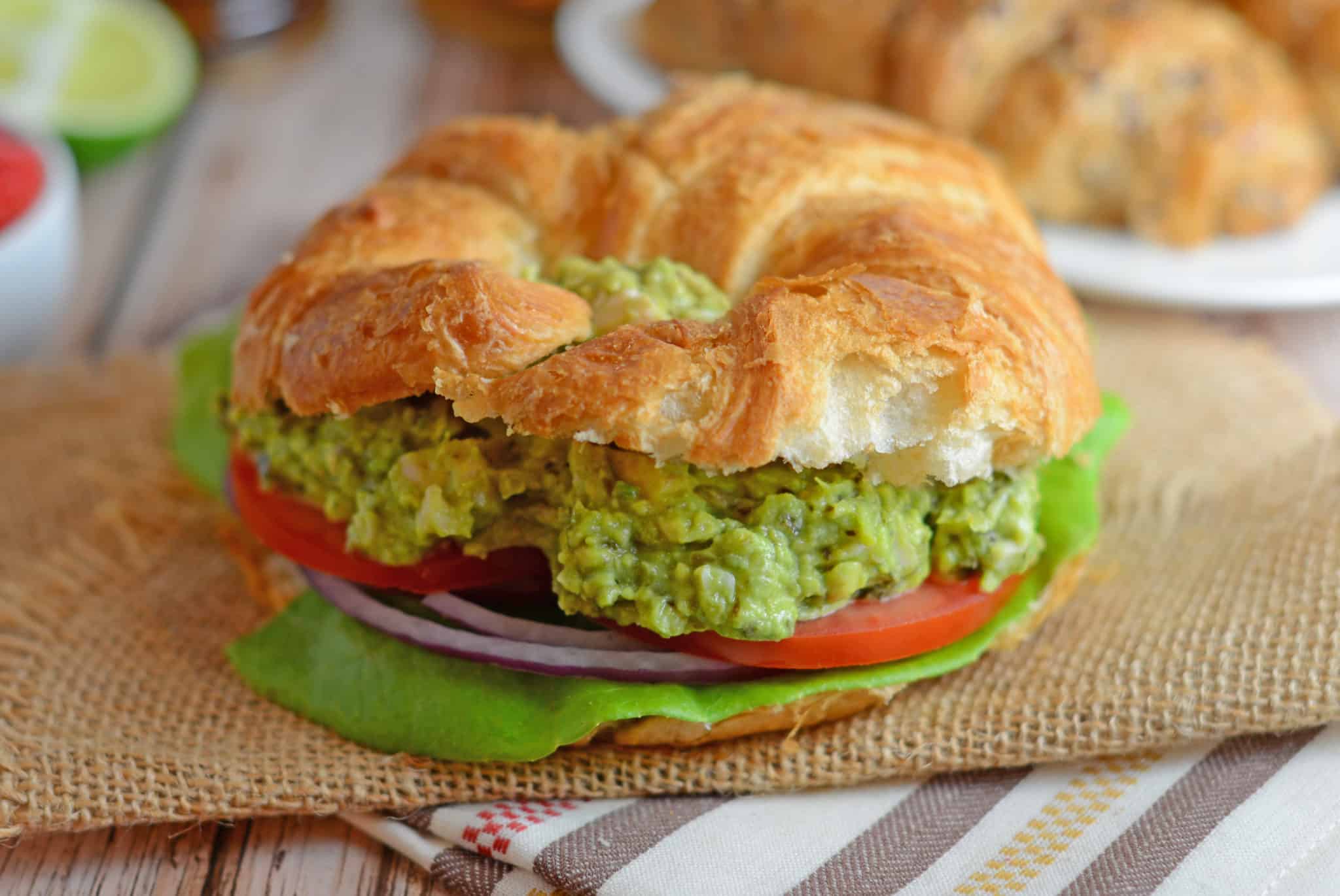 Avocado Chicken Salad Recipe - EASY and Healthy! Avocado pesto chicken salad is the perfect no-cook quick meal. No Mayo! www.savoryexperiments.com