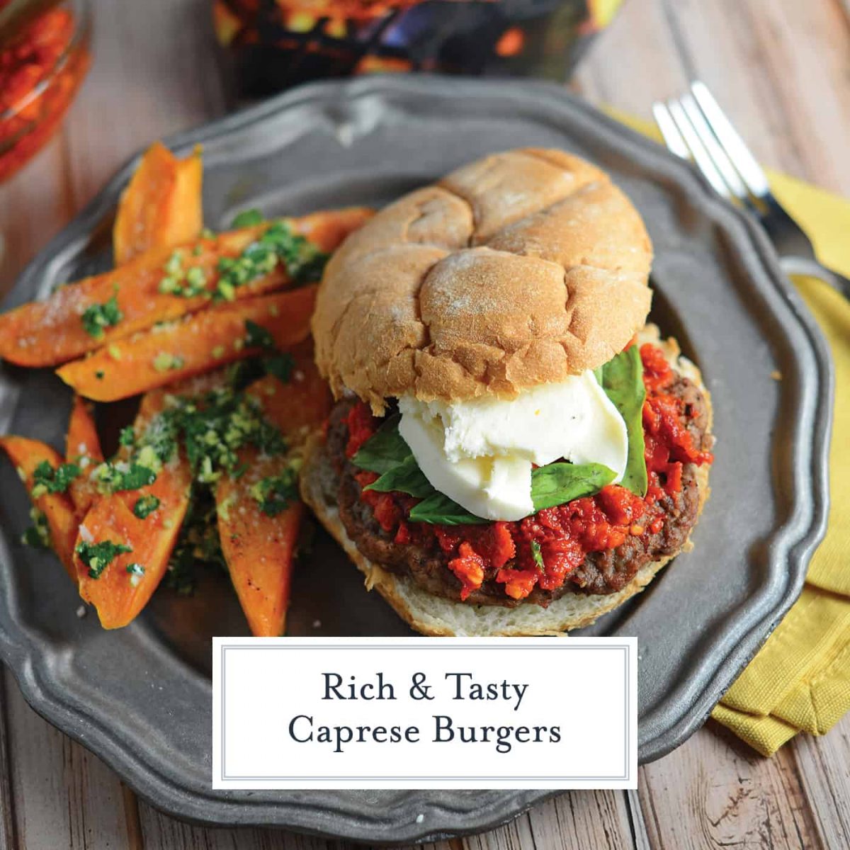 Caprese Burgers are smothered with a red pesto, fresh mozzarella and basil all on a flame-grilled burger. The best gourmet burger out there! #capreseburgers #gourmetburgers www.savoryexperiments.com