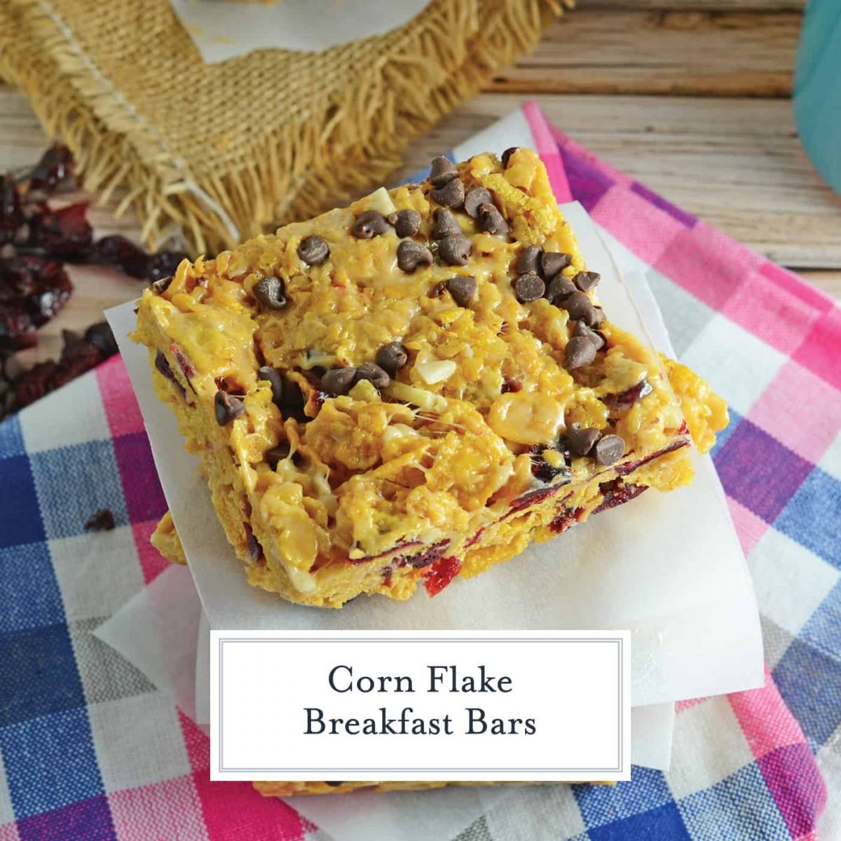 Corn Flake Breakfast Bars are a 15-minute handheld breakfast bar made from corn flakes, dried cranberries, slivered almonds, peanut butter, mini chocolate chips and marshmallows. #breakfastbars #makeaheadbreakfast www.savoryexperiments.com