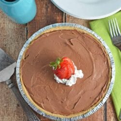 No-Bake Chocolate Cheesecake is a super creamy, quick and easy dessert recipe perfect for BBQs and parties. This dessert whips up in only 10 minutes! www.savoryexperiments.com