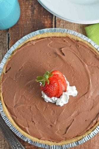 No-Bake Chocolate Cheesecake is a super creamy, quick and easy dessert recipe perfect for BBQs and parties. This dessert whips up in only 10 minutes! www.savoryexperiments.com