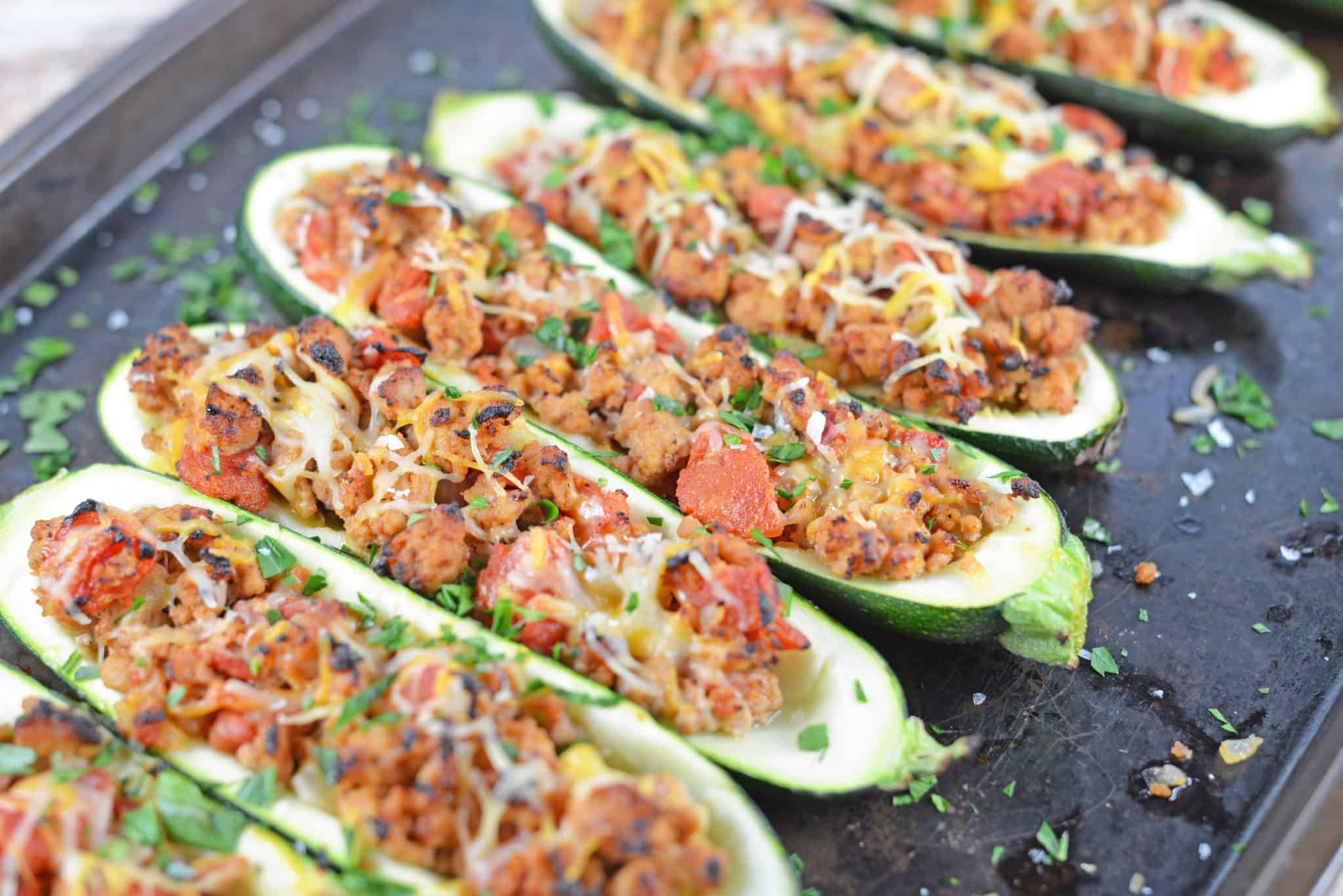 Grilled Turkey Zucchini Boats Recipe - Looking for grilling recipes? Turkey stuffed zucchini makes the perfect healthy dinner! One of the best zucchini recipes I’ve ever made. www.savoryexperiments.com 