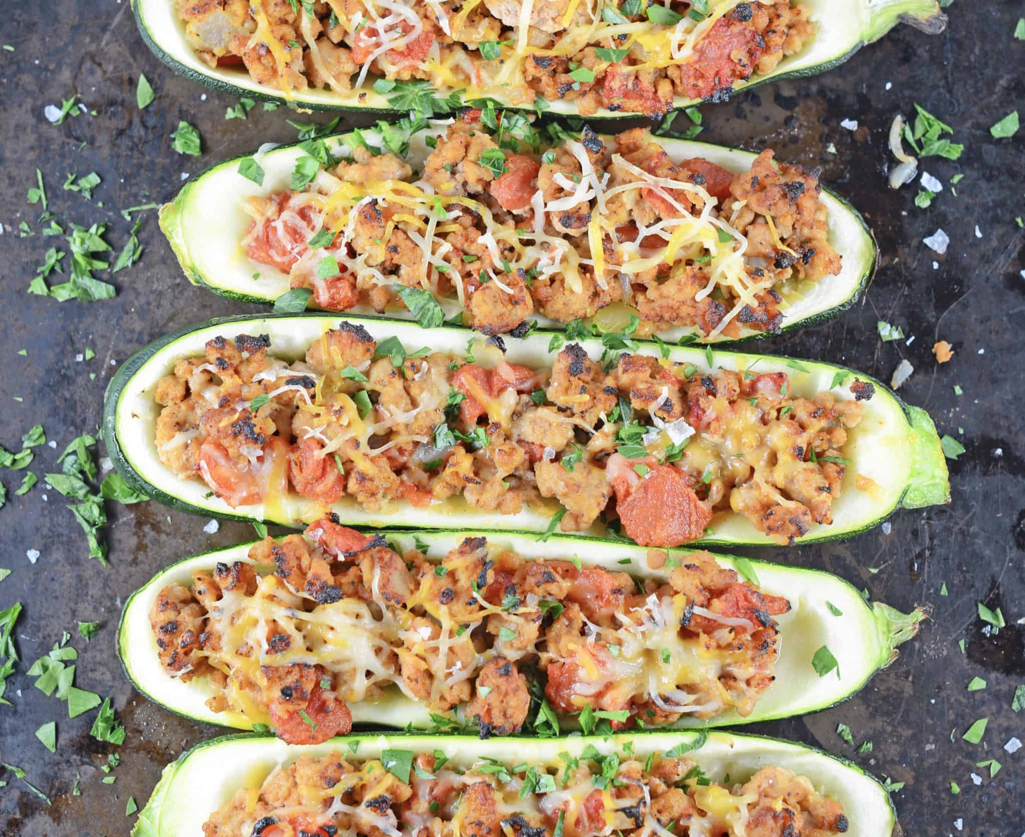 Grilled Turkey Zucchini Boats Recipe - Looking for grilling recipes? Turkey stuffed zucchini makes the perfect healthy dinner! One of the best zucchini recipes I’ve ever made. www.savoryexperiments.com 