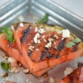 Close up of Grilled Watermelon Steaks on a tray