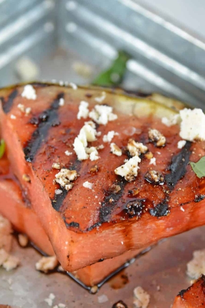 Close up of Grilled Watermelon Steaks on a tray