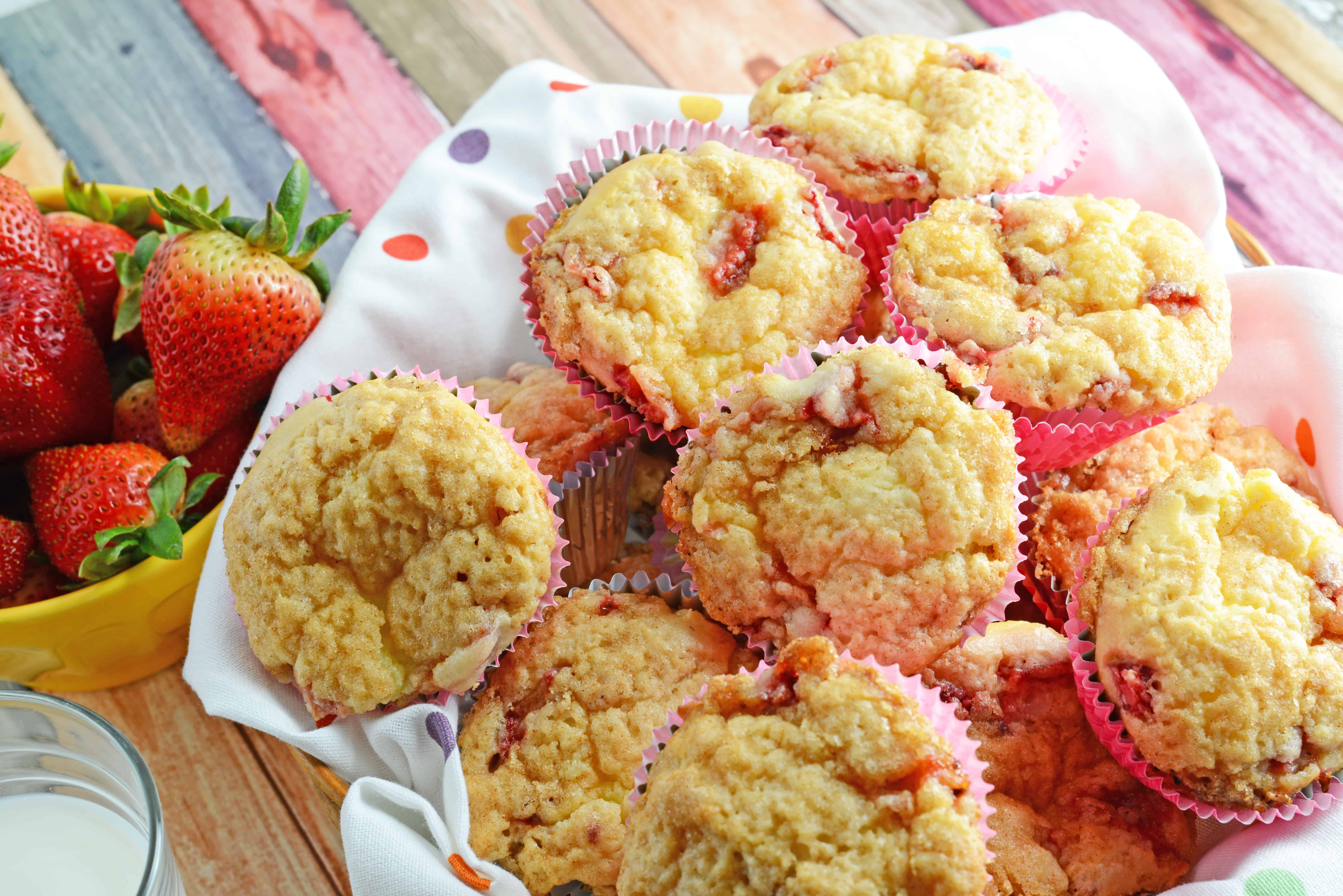 Strawberry Cream Cheese Muffins-- like eating strawberries 'n cream cupcakes for breakfast!! Super moist and creamy using fresh or frozen strawberries. www.savoryexperiments.com