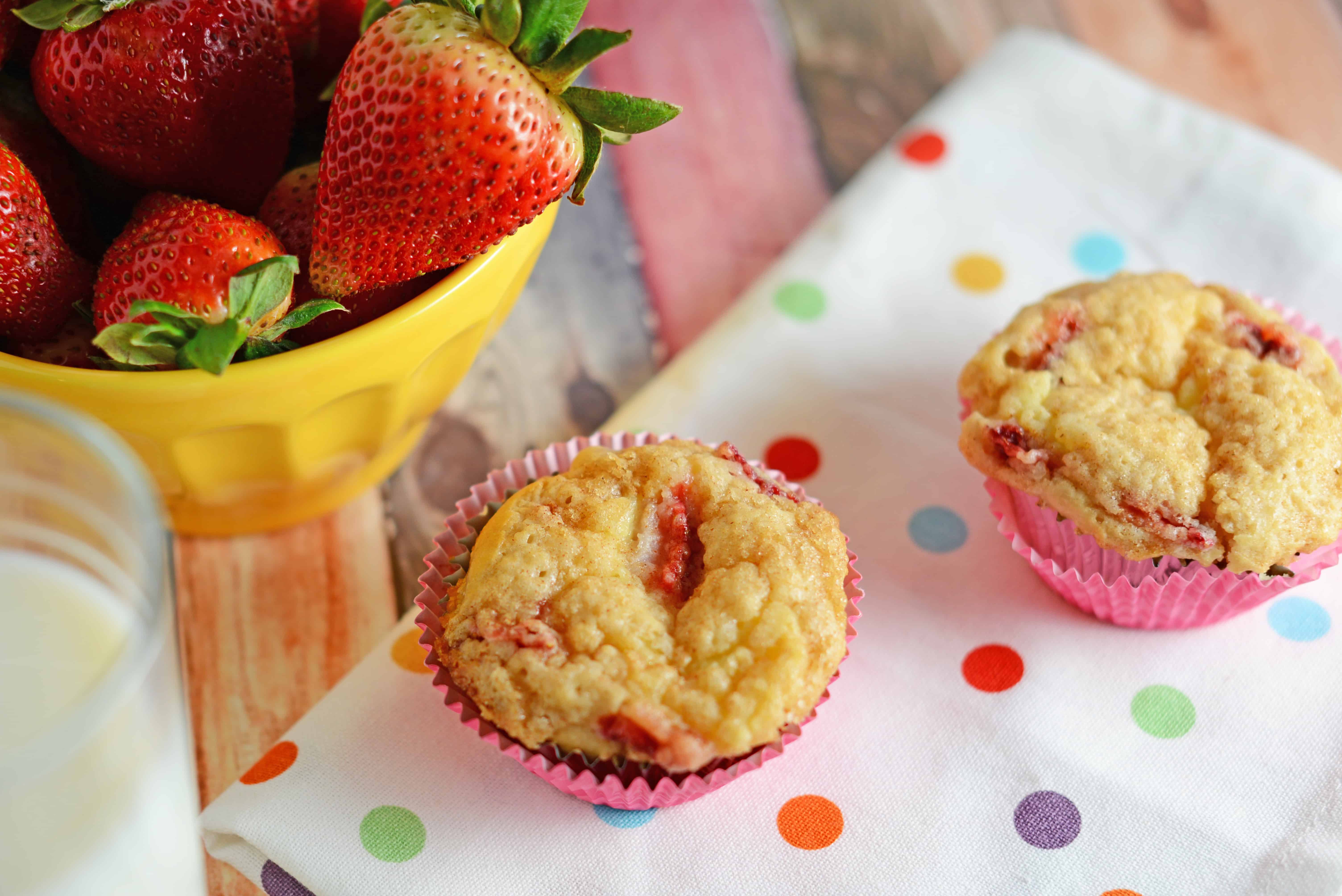 Strawberry Cream Cheese Muffins-- like eating strawberries 'n cream cupcakes for breakfast!! Super moist and creamy using fresh or frozen strawberries. www.savoryexperiments.com