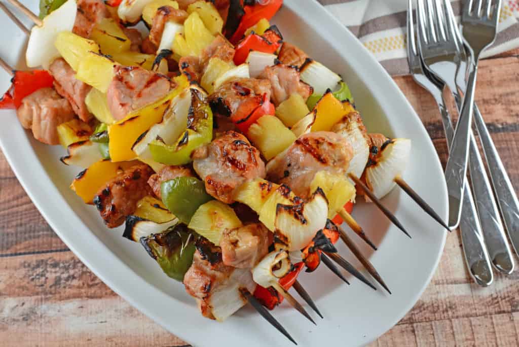 Teriyaki Pork Kabobs Recipe – Kabobs on the grill are a class summer meal. Marinated pork tenderloin paired with pineapple, bell pepper and sweet onion, makes this kabob recipe an quick dinner recipe. www.savoryexperiments.com Teriyaki Pork Kabobs Recipe - Kabobs on the grill are a class summer meal. Marinated pork tenderloin paired with pineapple, bell pepper and sweet onion, makes this kabob recipe an quick dinner recipe. www.savoryexperiments.com