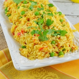 Baked Rice Pilaf - You'll never buy the packaged rice pilaf ever again once you've made our version! Plus, a fool proof way of getting the perfect rice every time… in the oven! www.savoryexperiments.com