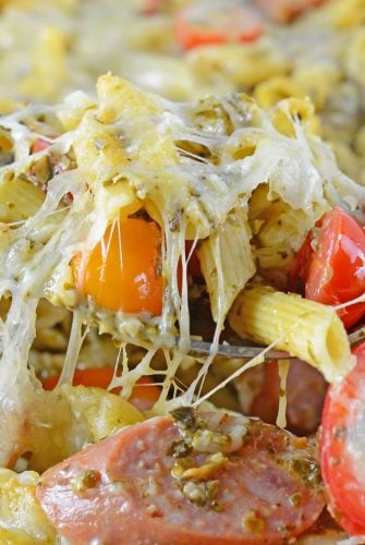 Pasta Bake is the perfect easy pasta dish for busy weeknights. Creamy pesto sauce, penne, smoked sausage and Italian cheese make this the perfect meal.