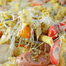 Pasta Bake is the perfect easy pasta dish for busy weeknights. Creamy pesto sauce, penne, smoked sausage and Italian cheese make this the perfect meal.