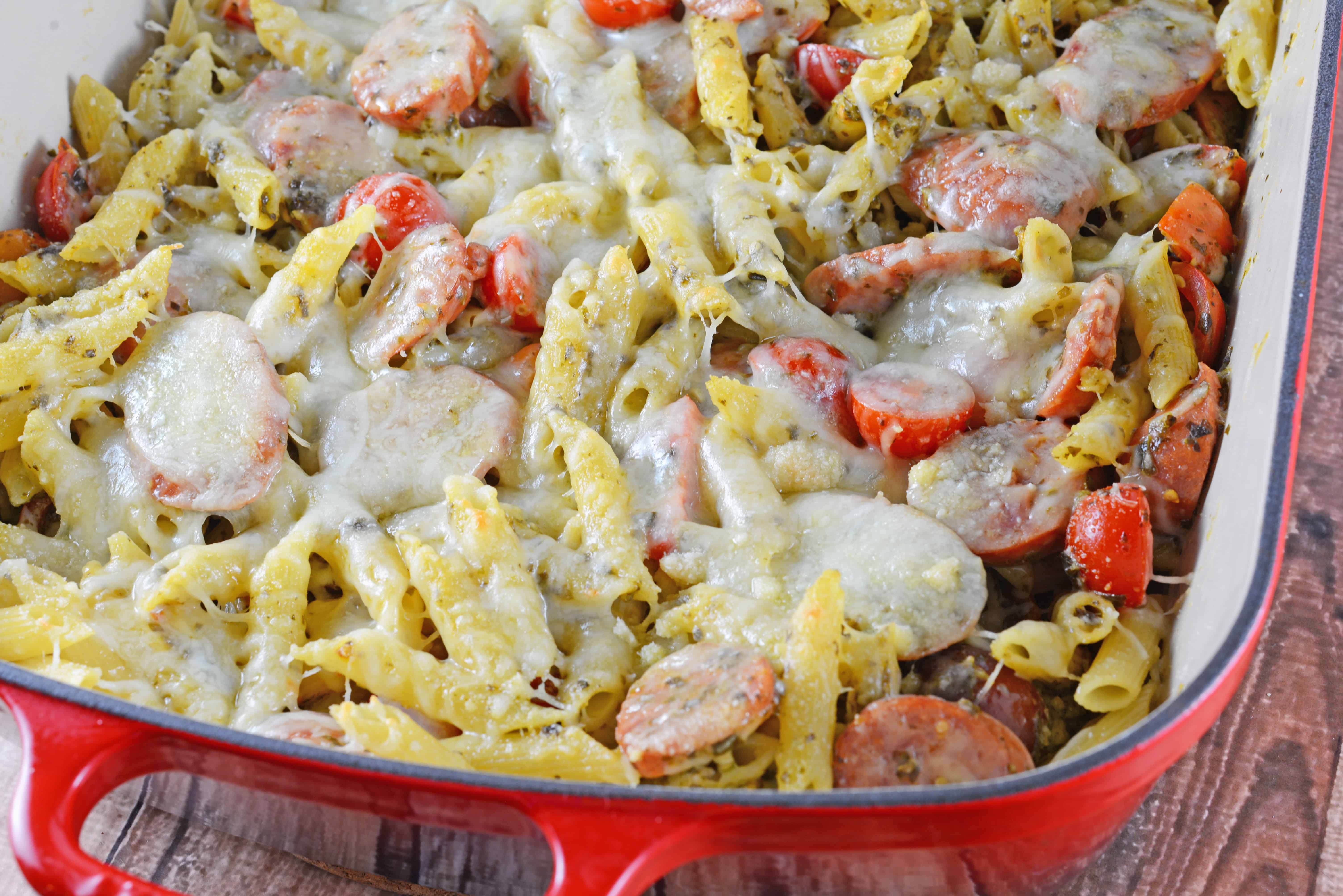 Pasta Bake is the perfect easy pasta dish for busy weeknights. Creamy pesto sauce, penne, smoked sausage and Italian cheese make this the perfect meal.