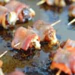 Bacon Wrapped Dates are an easy, 4 ingredient appetizer or snack perfect for watching the big game in your pajamas or a fancy cocktail party.