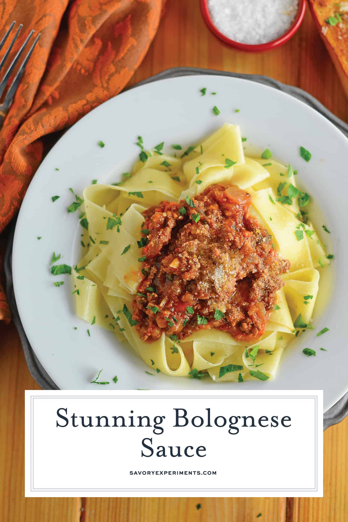 Bolognese Sauce is a classic, rich and hearty Italian sauce made with ground meat and coarsely chopped vegetables. Serve over pasta or in lasagna. #bolognesesauce #bologneserecipe www.savoryexperiments.com
