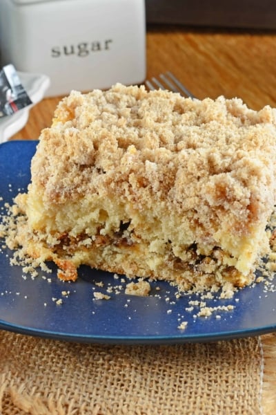 This is a classic Coffee Cake Recipe. Cinnamon streusel topping and a ribbon of brown sugar filling make this moist cake perfect for breakfast, brunch or serving with afternoon tea.