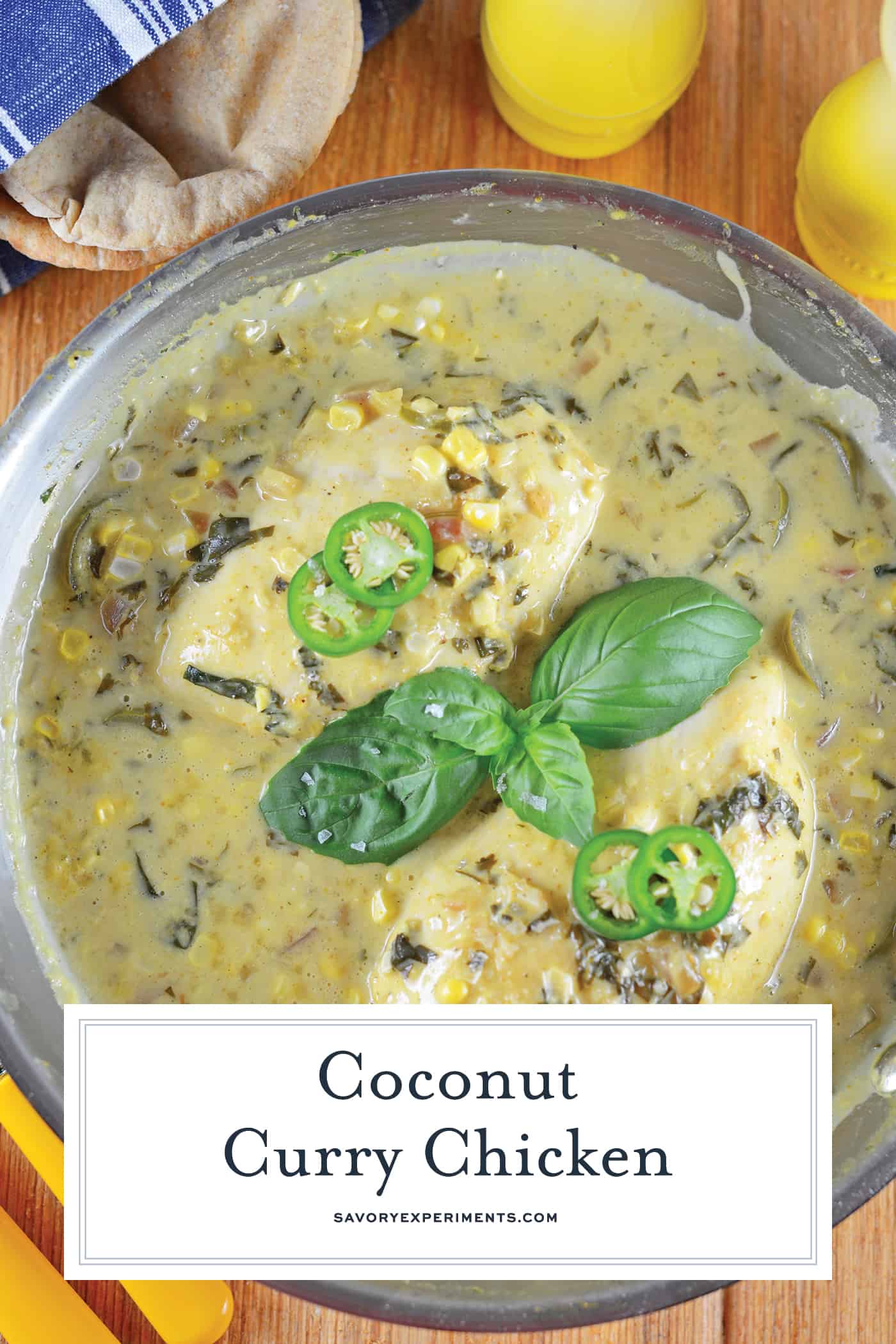Coconut Chicken curry is an easy classic Indian recipe using only one pan, coconut milk, basil, cilantro, jalapeños, corn and lime juice! #coconutcurrysauce #currysauce #coconutcurry www.savoryexperiments.com