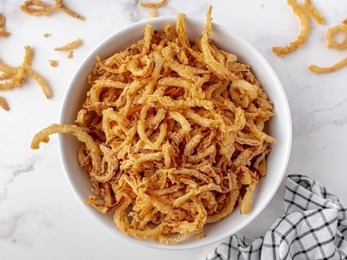 Crispy Onion Strings - Deliciously Seasoned