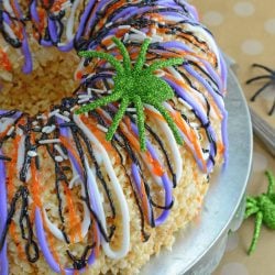 Halloween Rice Krispie Cake is stuffed with fluff! What better way to celebrate the holiday than with a giant homemade rice krispies treat?