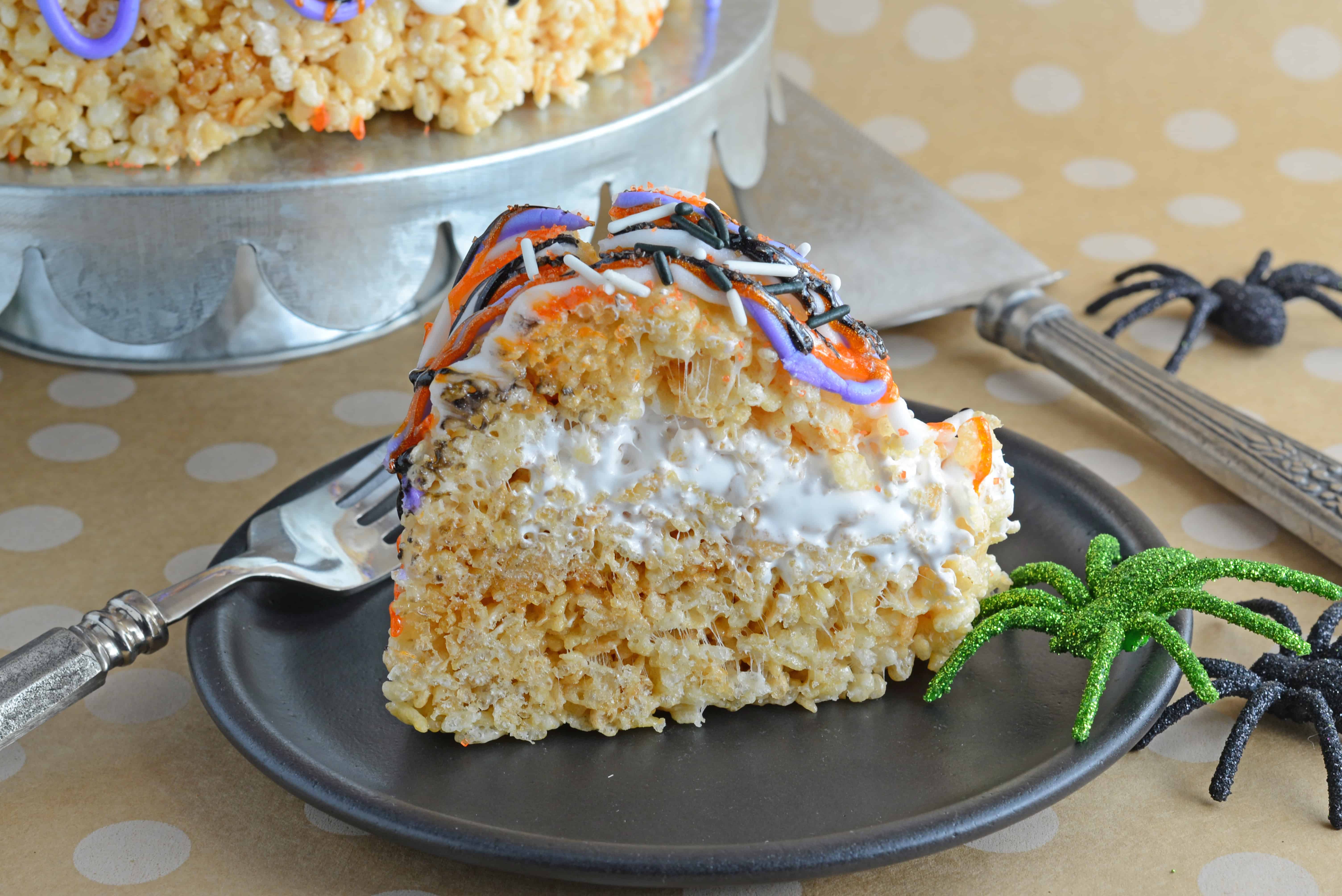 Halloween Rice Krispie Cake is stuffed with fluff! What better way to celebrate the holiday than with a giant homemade rice krispies treat?