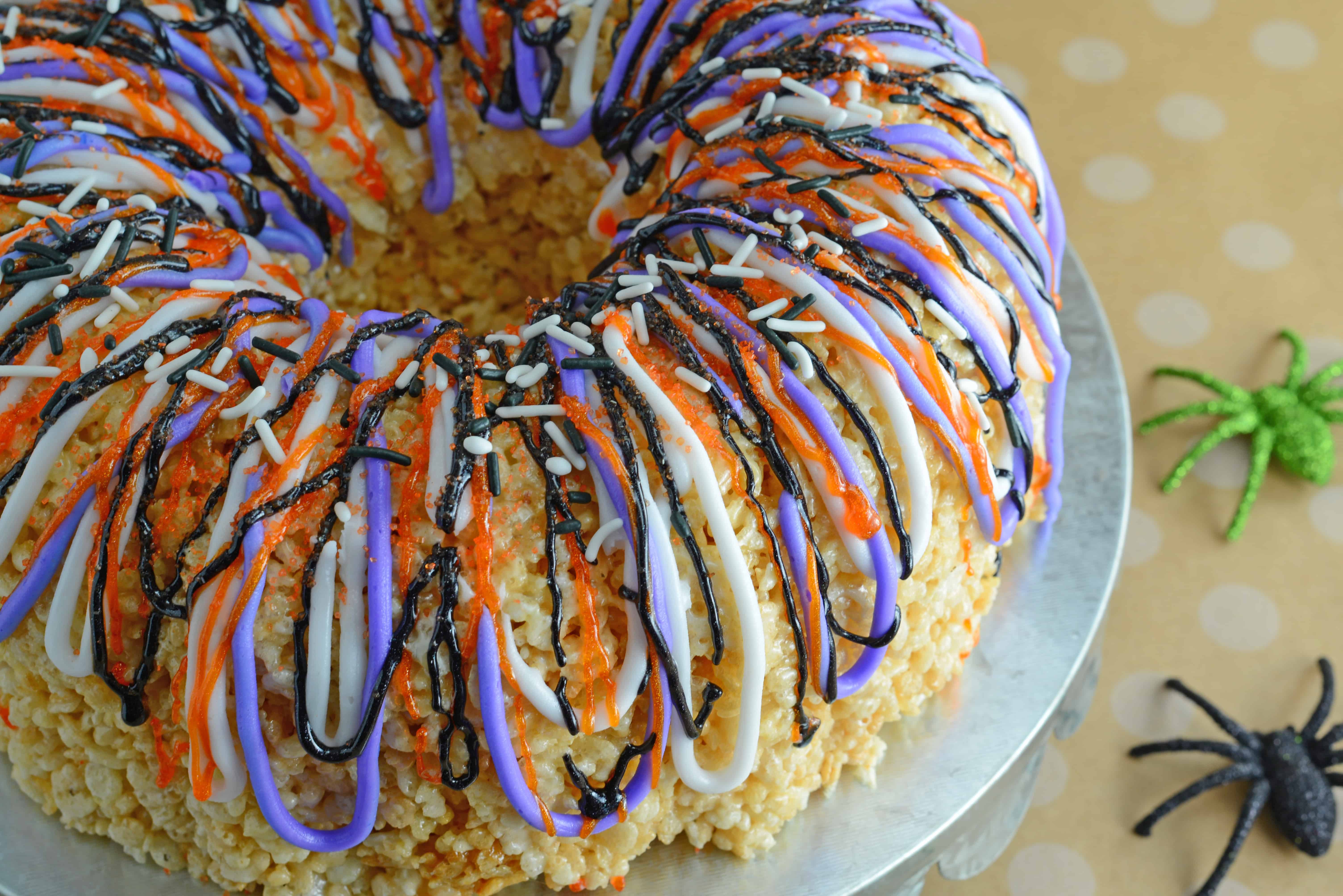 Halloween Rice Krispie Cake is stuffed with fluff! What better way to celebrate the holiday than with a giant homemade rice krispies treat?