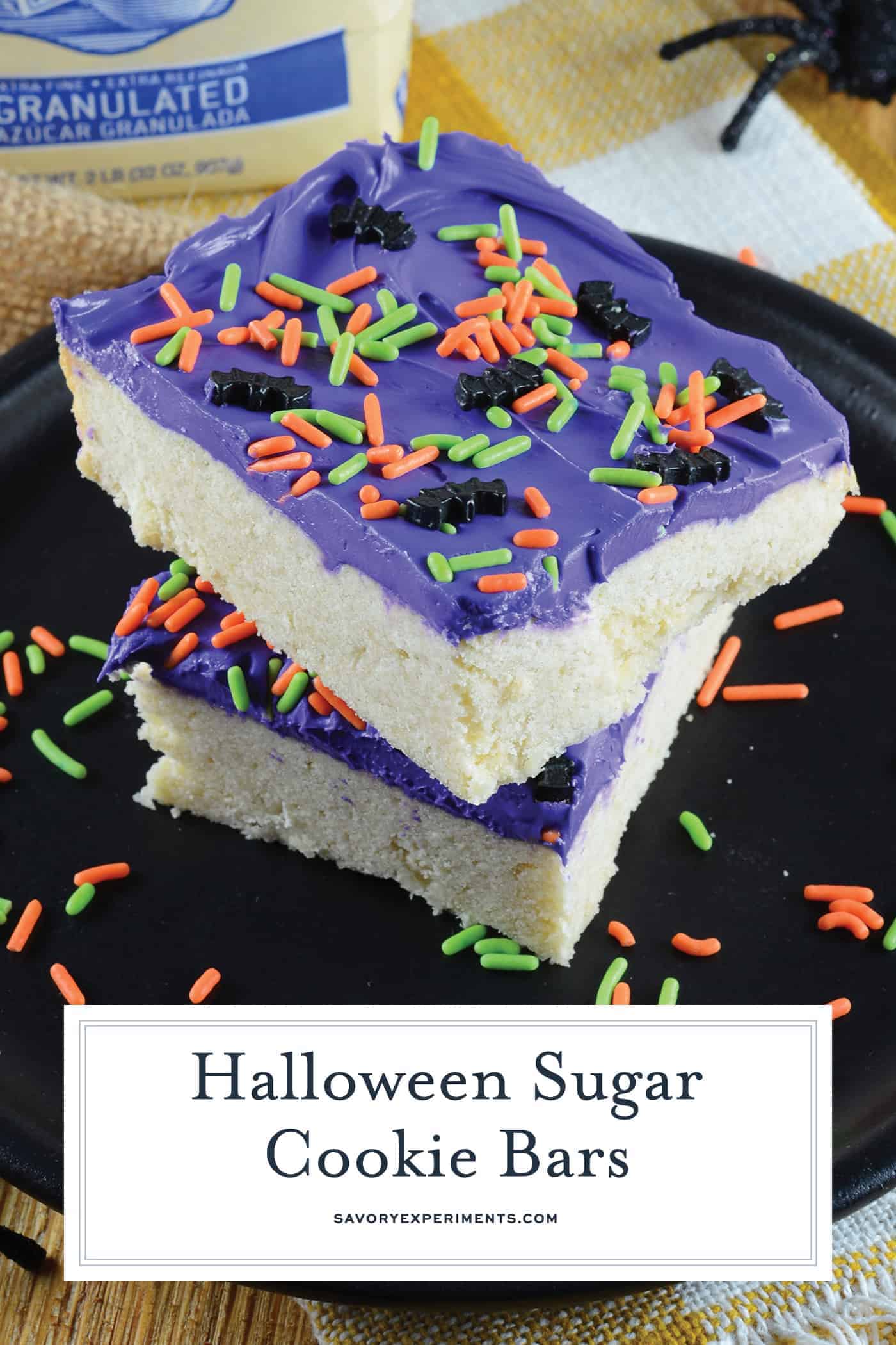 Halloween Sugar Cookie Bars are thick and chewy, frosted with a classic buttercream and topped with festive sprinkles. Perfect for the whole family! #sugarcookiebars #halloweendesserts #halloweensnacks www.savoryexperiments.com