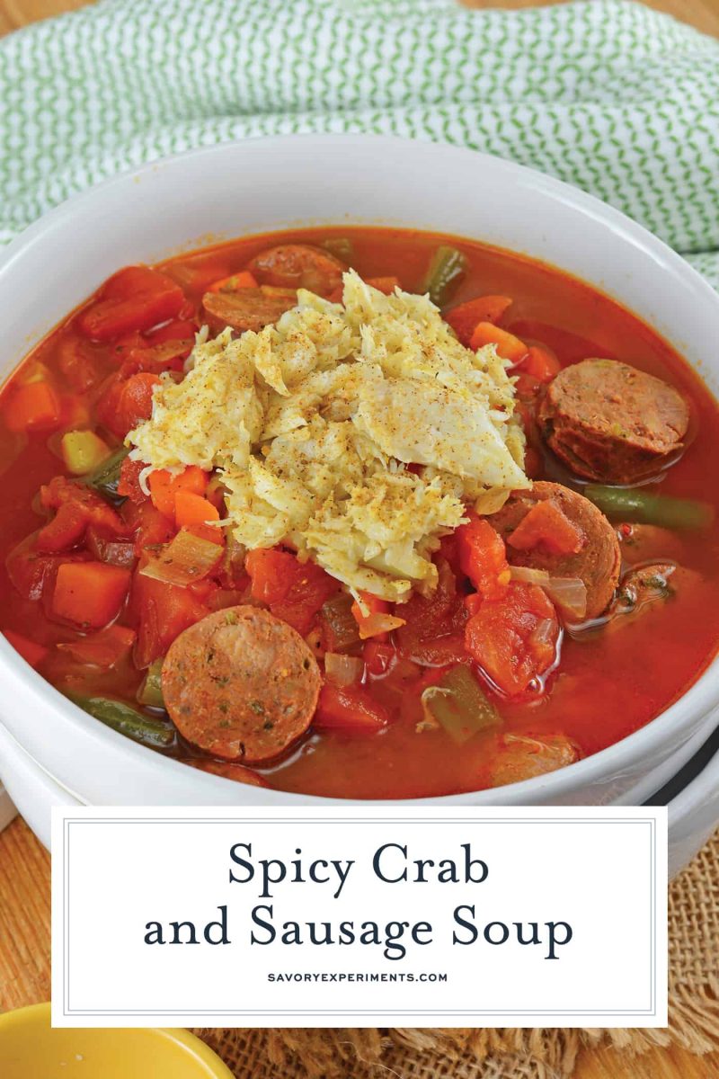 Spicy Crab and Sausage Soup is a quick, easy and flavorful appetizer or dinner recipe! Packed full of vegetables, sausage and crab, you can't go wrong! #crabsoup #sausagesoup #spicysouprecipes www.savoryexperiments.com