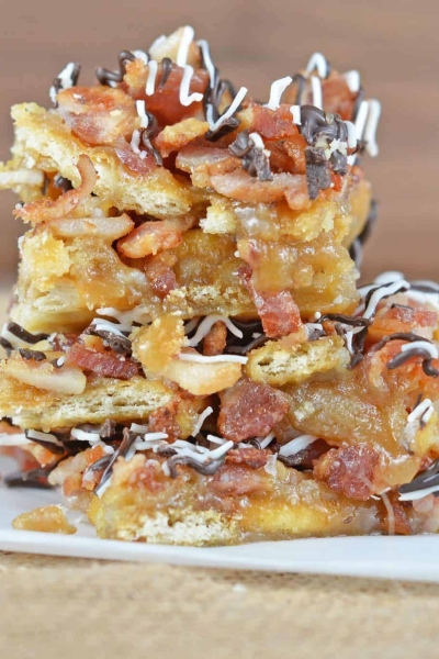 Chocolate Bacon Saltine Toffee is additively delicious, easy to make and the perfect addition to any holiday cookie tray!