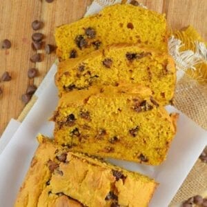 Chocolate Chip Pumpkin Bread is easy to make, soft and flavorful. A perfect loaf for breakfast or dessert on a holiday or any other day! #pumpkinchocolatechipbread #pumpkinbreadwithchocolatechips www.savoryexperiments.com