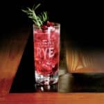 Holiday Whiskey Fizz is a bubbly holiday cocktail featuring Sagamore Spirits rye whiskey, club soda, cranberry syrup and lime juice.