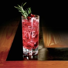 Holiday Whiskey Fizz is a bubbly holiday cocktail featuring Sagamore Spirits rye whiskey, club soda, cranberry syrup and lime juice.