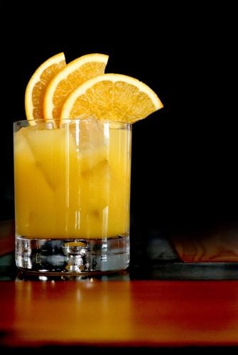 Orange Frost Cocktail is a refreshing and festive holiday cocktail. Blended with Sagamore Spirit rye whiskey, lemon and orange juice and maple syrup, make this your holiday party cocktail!