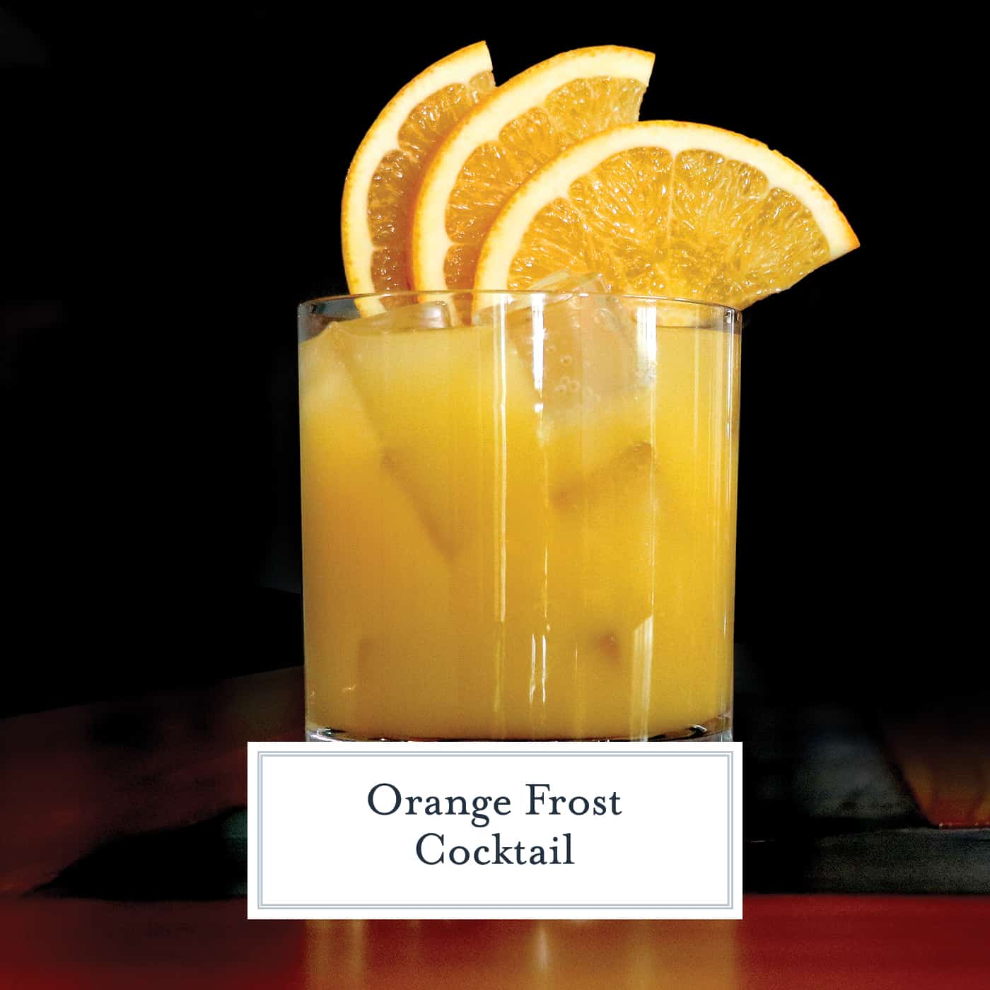 Orange Frost Cocktail is a refreshing and festive holiday cocktail using whiskey, lemon and orange juice and maple syrup. Make this your holiday party cocktail! #whiskeycocktails www.savoryexperiments.com 