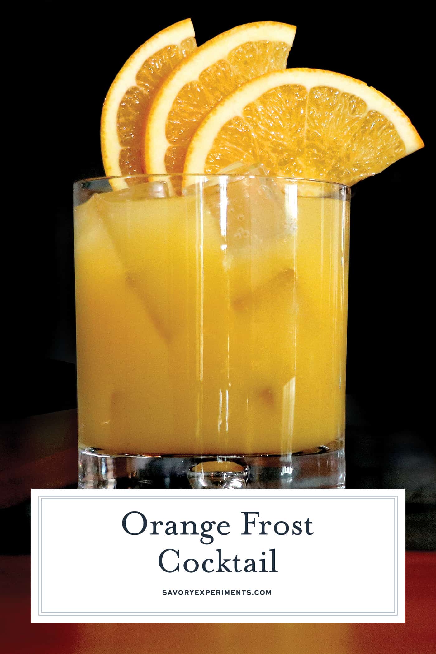 Orange Frost Cocktail is a refreshing and festive holiday cocktail using whiskey, lemon and orange juice and maple syrup. Make this your holiday party cocktail! #whiskeycocktails www.savoryexperiments.com