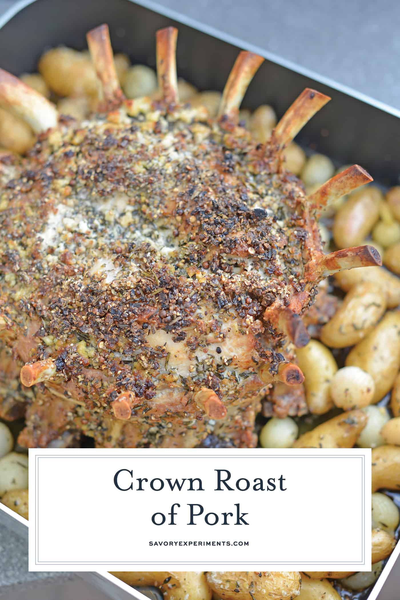 Crown Pork Roast is the perfect special occasion or holiday meal to serve for a crowd. Tasty and impressive presentation make this a winning pork recipe! #crownroastofpork #porkcrownroast www.savoryexperiments.com