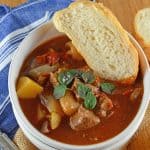 Beef Stew is one of the most iconic comfort foods and this version features tender beef, onions, potatoes, fire roasted tomatoes in a rich herb filled stew. This recipe can be made in the slow cooker or Dutch oven.