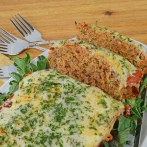 Italian Meatloaf blends Italian sausage and ground beef with spices and cheese for a tender one dish meal. The perfect family meal! #bestmeatloafrecipes #italianmeatloaf www.savoryexperiments.com