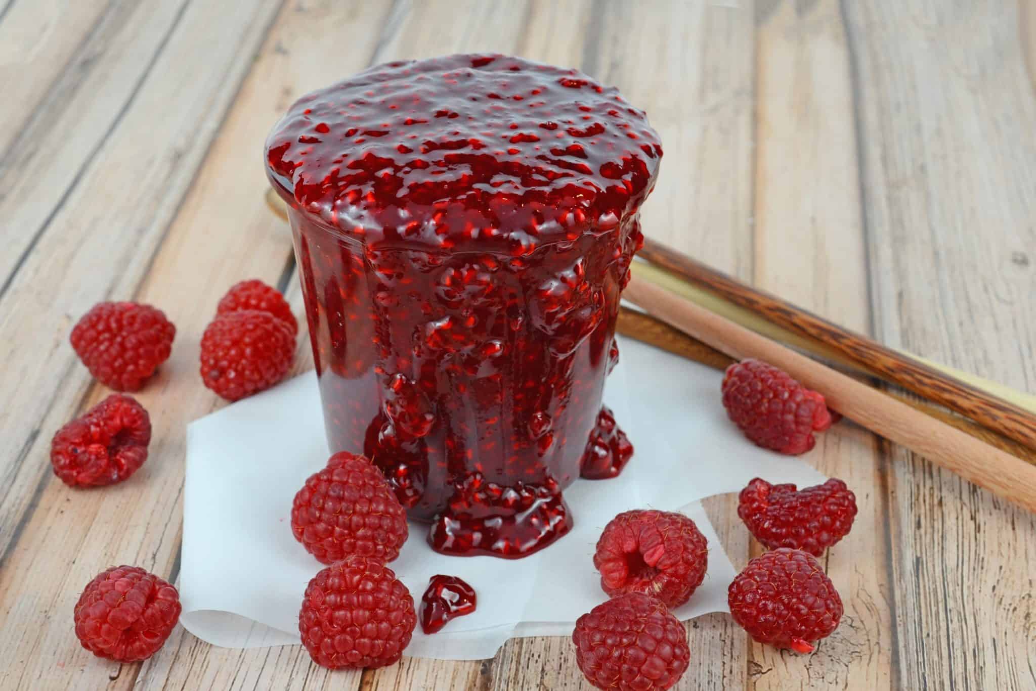 Easy Raspberry Sauce is so versatile, use it on ice cream cheesecake, meringues, chocolate cake and more! And it only takes 5 ingredients and 20 minutes!