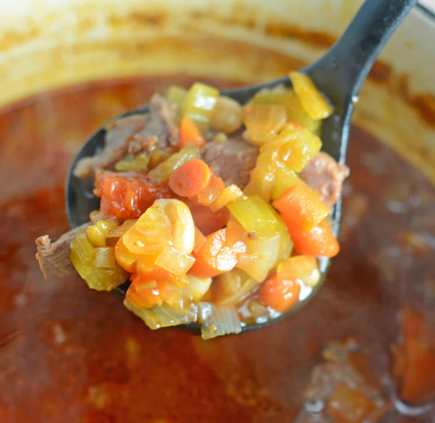 Short Rib Soup Recipe- a hearty comforting soup made with vegetables and shredded short ribs. Also known as Booyah in parts of the US. This soup can be served as an appetizer or entree and freezes well.