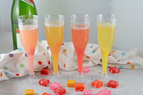 Starburst Champagne Cocktails Make a new Champagne Cocktails using Starburst candy! Add your favorite Starburst flavor to any sparkling wine or cider and allow to dissolve for beautiful color and fun flavor!