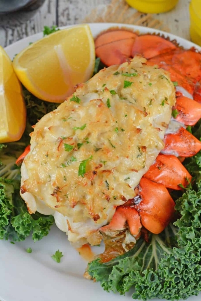 Crab Stuffed Lobster Tails is the ideal dinner for a special occasion. You won't believe how easy they are to make and how good they are! #lobsterrecipes #stuffedlobstertails www.savoryexperiments.com