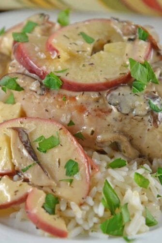 Creamy Apple Pork Chops are a wholesome meal your whole family will enjoy. Mushrooms, apples, juicy pork chops in a savory cream sauce.