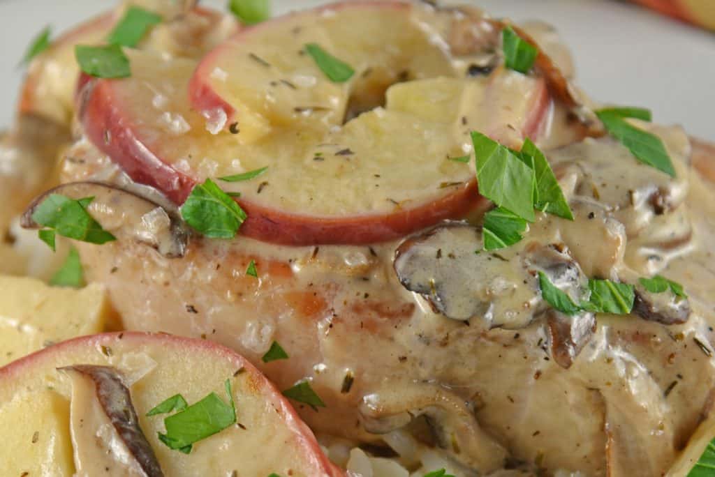 Creamy Apple Pork Chops are a wholesome meal your whole family will enjoy. Mushrooms, apples, juicy pork chops in a savory cream sauce all ready in just 15 minutes. Serve with rice, couscous or noodles. #easyporkchoprecipe www.saovryexperiments.com