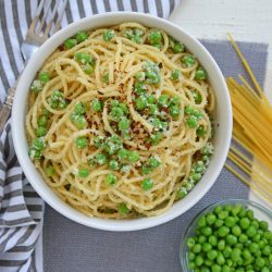 overhead of pasta and peas recipe in a bowl