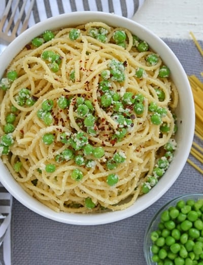 overhead of pasta and peas recipe in a bowl